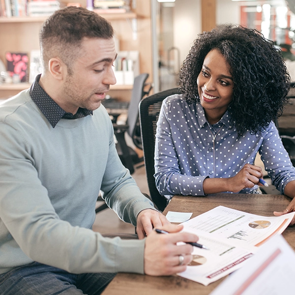 man and woman working on a mortgage application