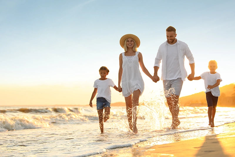 family walking on beach