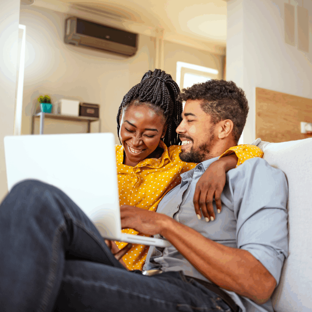 Couple using laptop